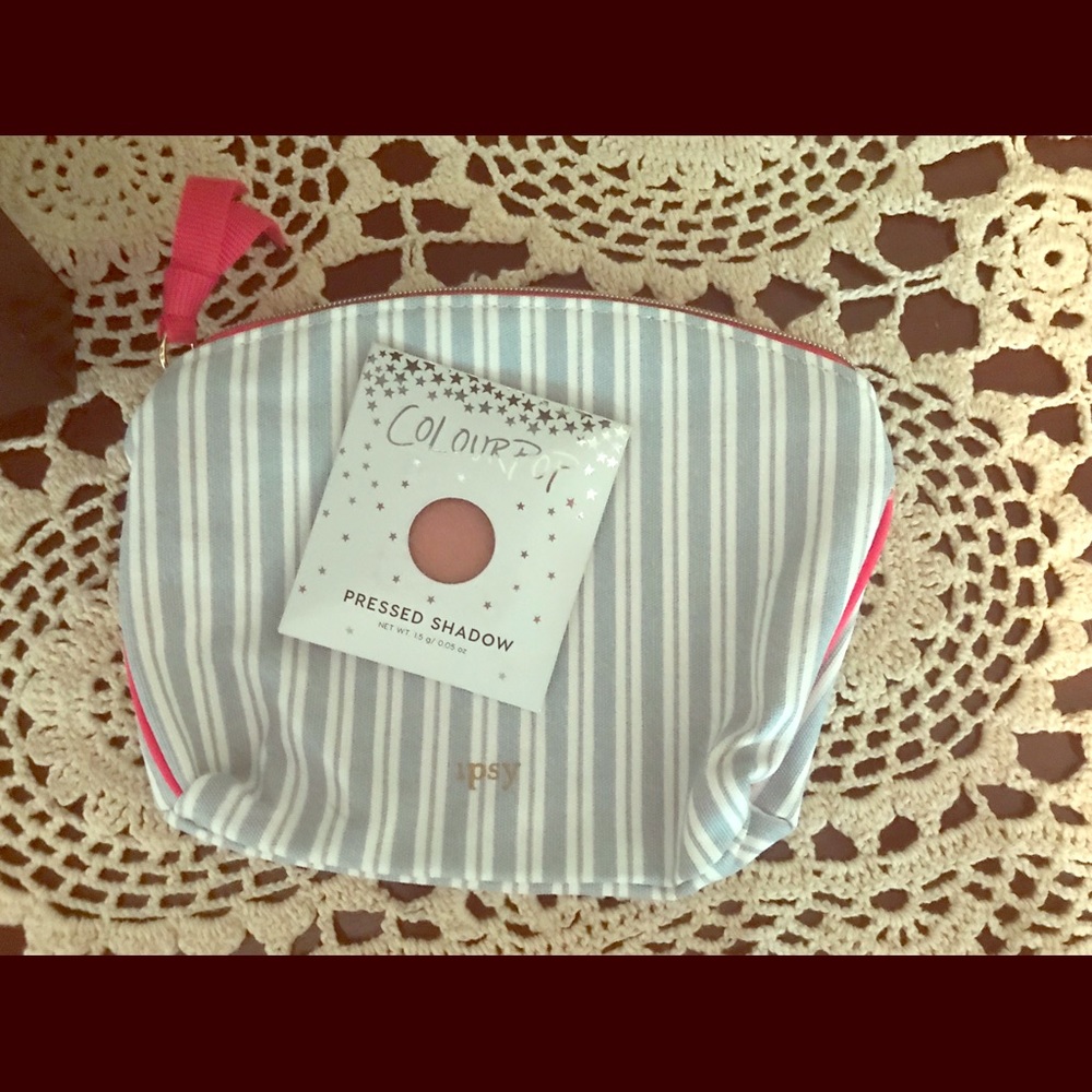Ipsy bag with makeup.